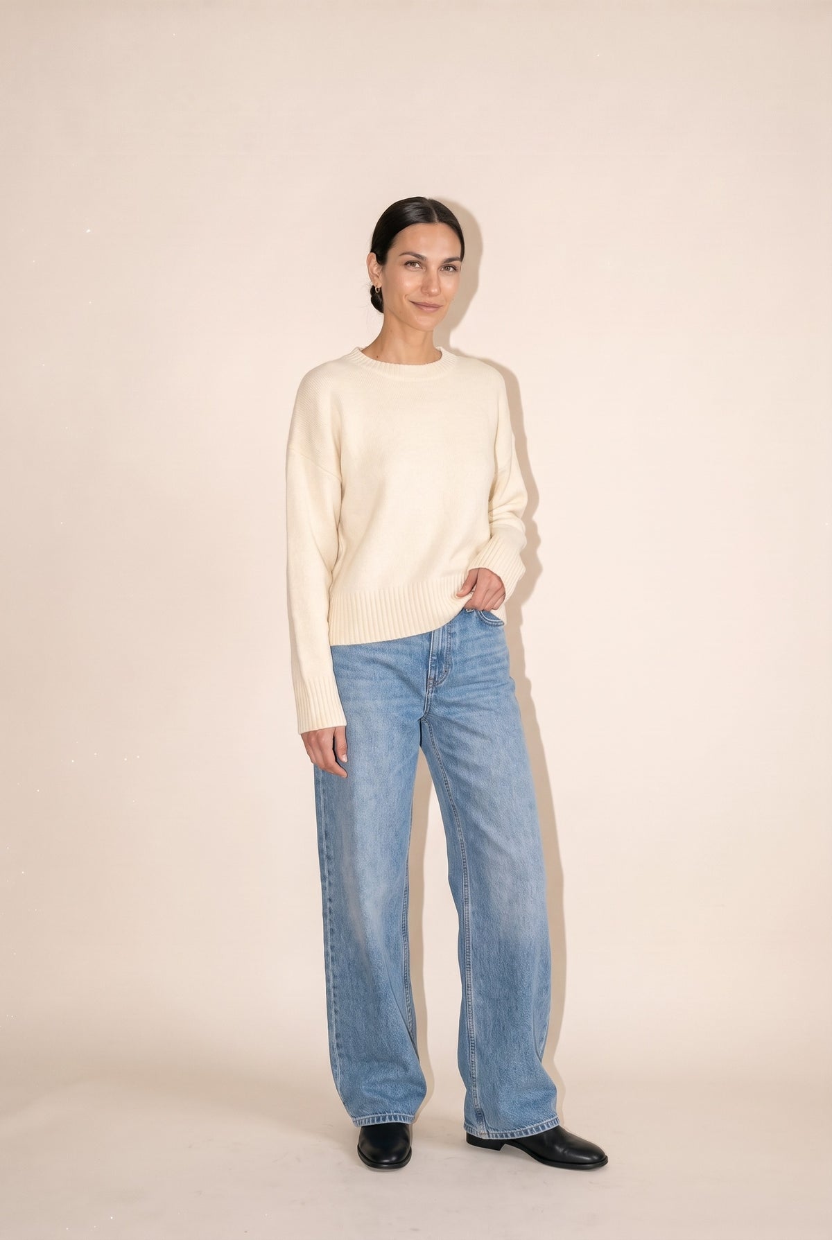 Relaxed Fit Crew Neck Sweater in cream — styled with wide-leg denim
