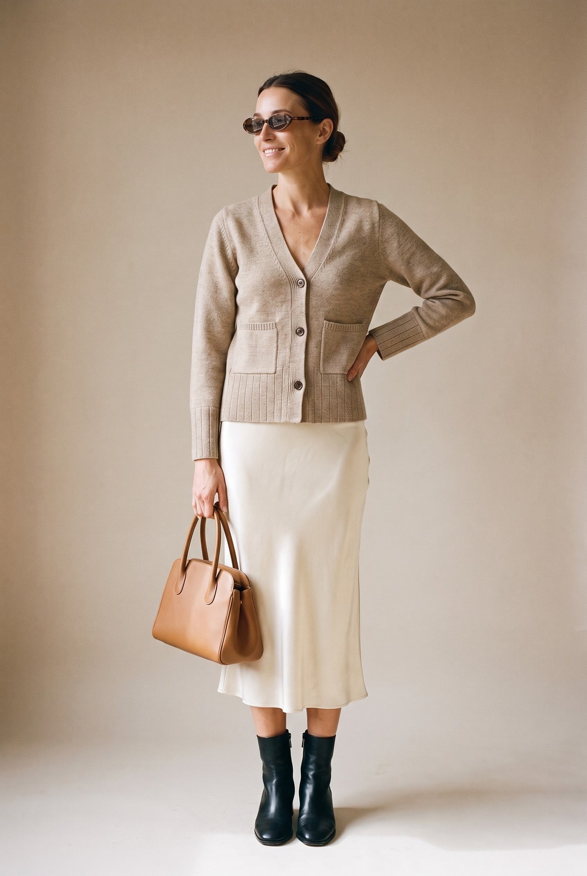 The Allison Cardigan in beige — front