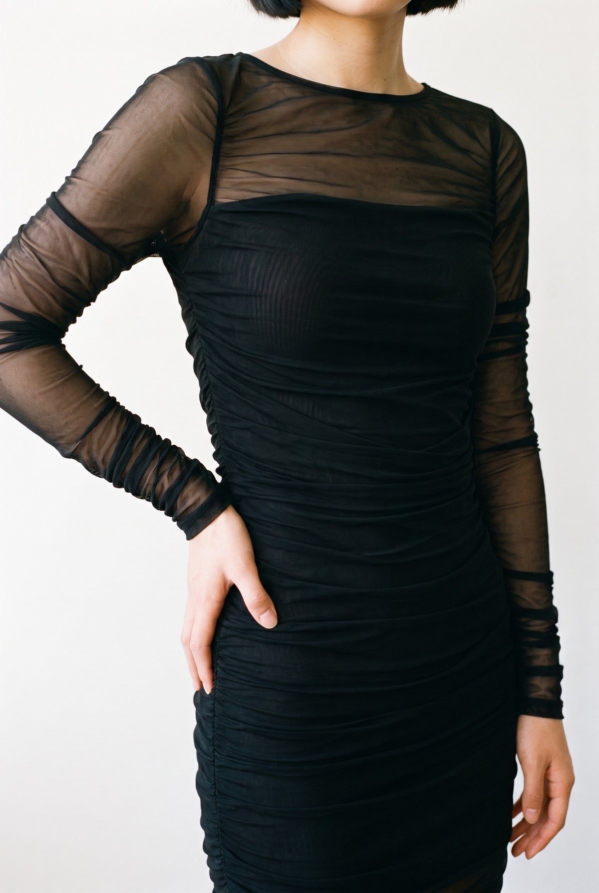 Lili Mesh Mini Dress in black — ruched mesh detail