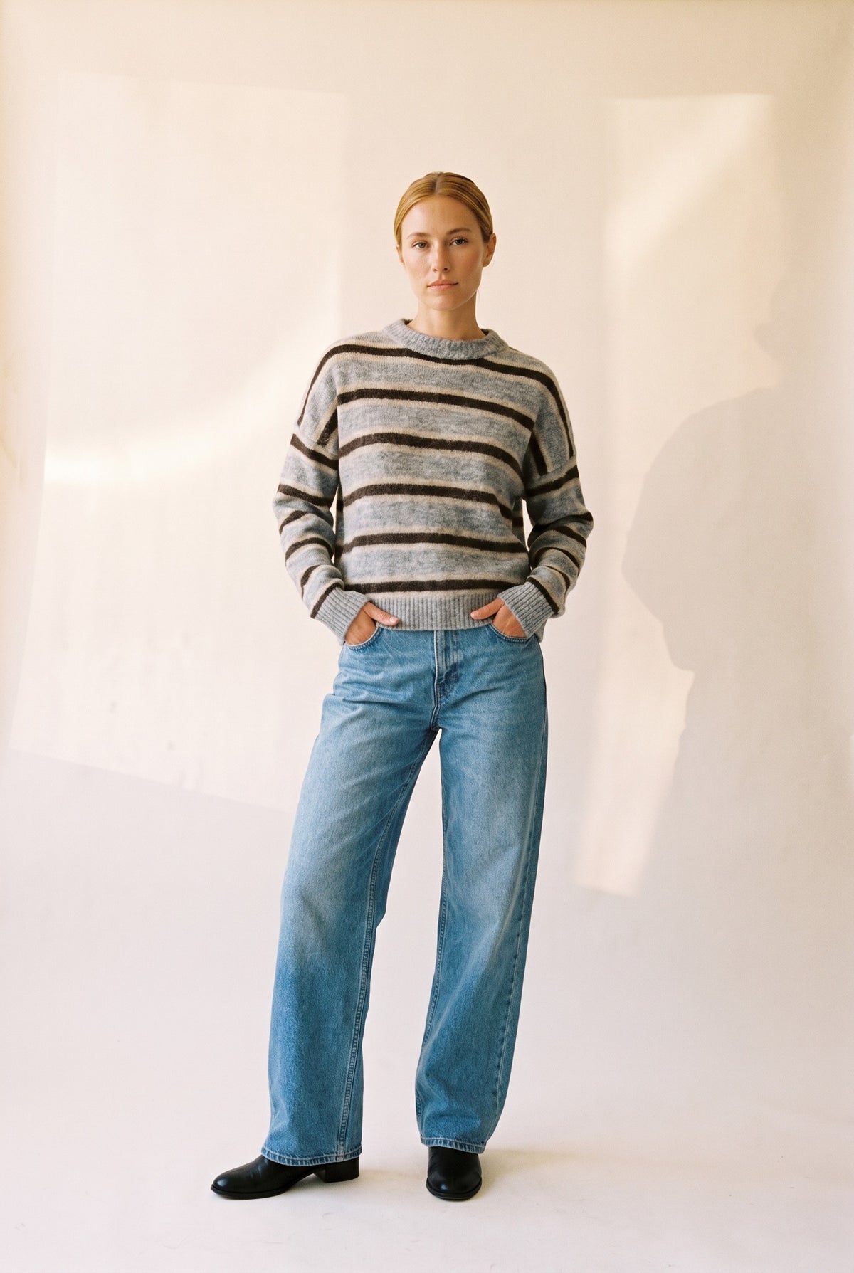Sutton Striped Sweater in heather grey brown — styled with wide-leg denim