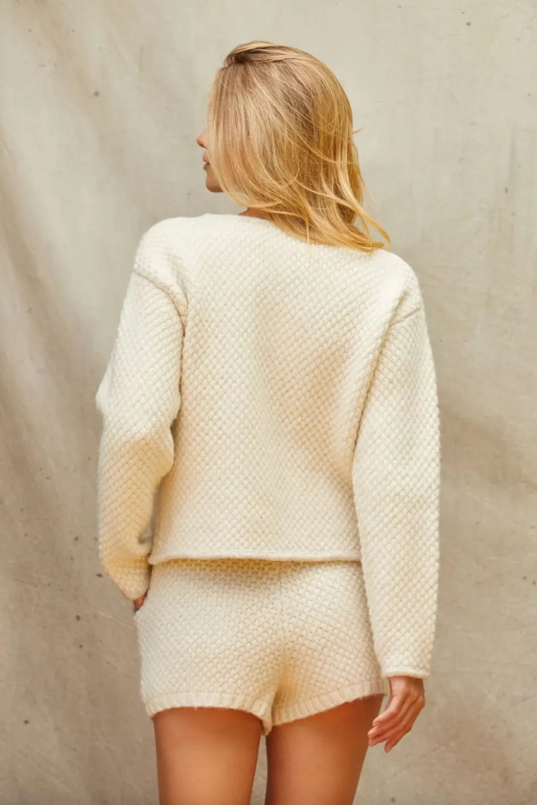 Veste en maille bouclée couleur crème