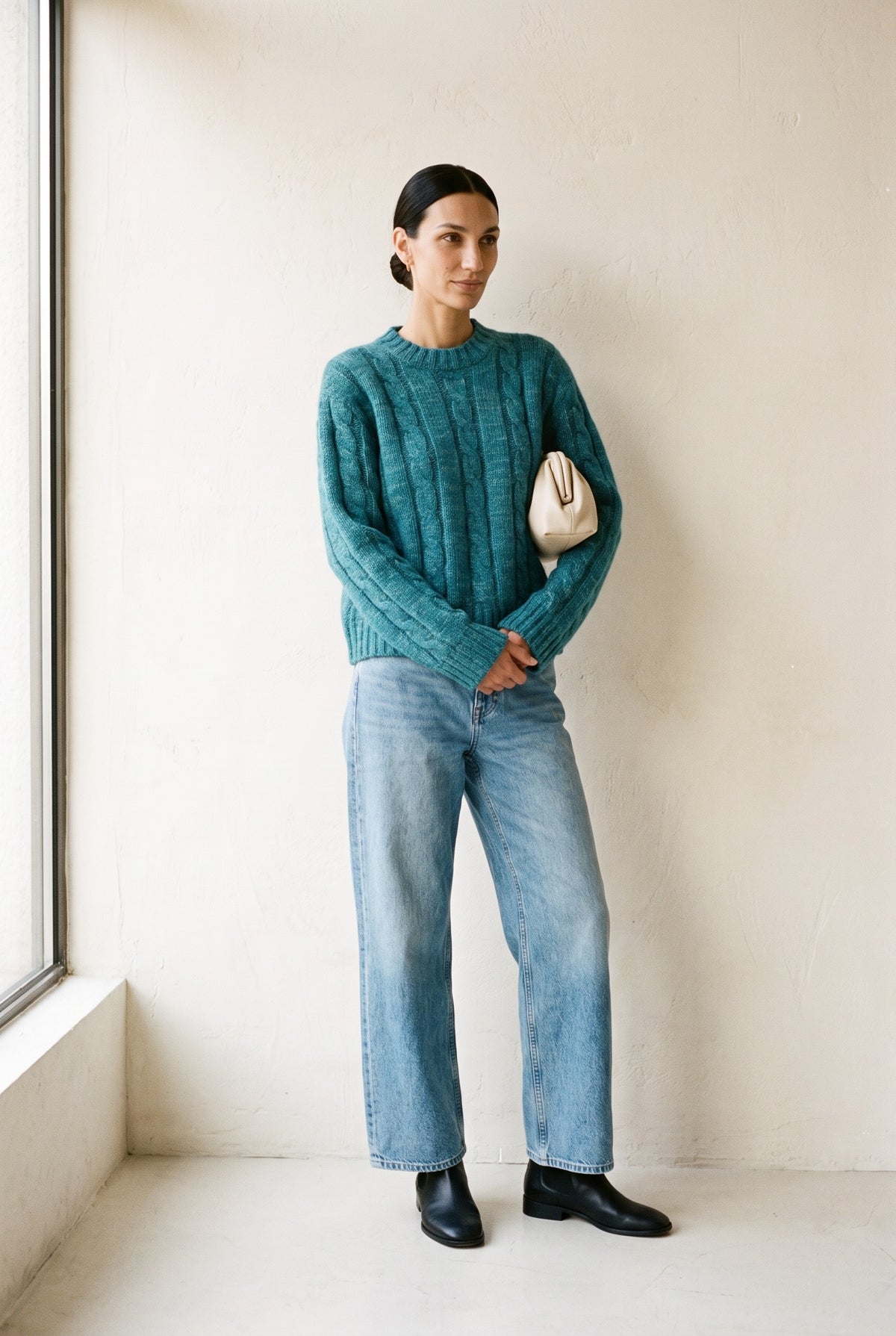 The Danica Sweater in green multi — styled with wide-leg denim