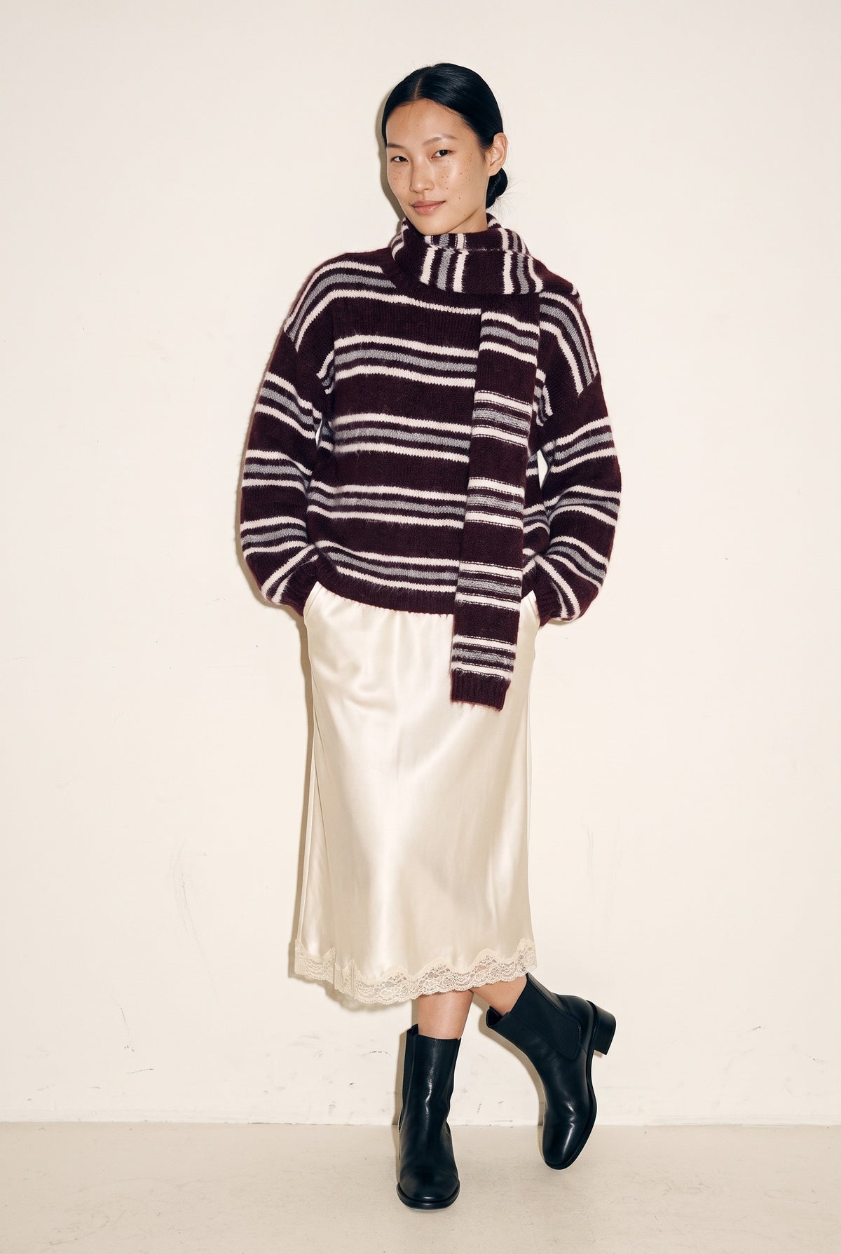 Crew Neck Stripe Pullover Sweater in burgundy — full length with satin slip skirt