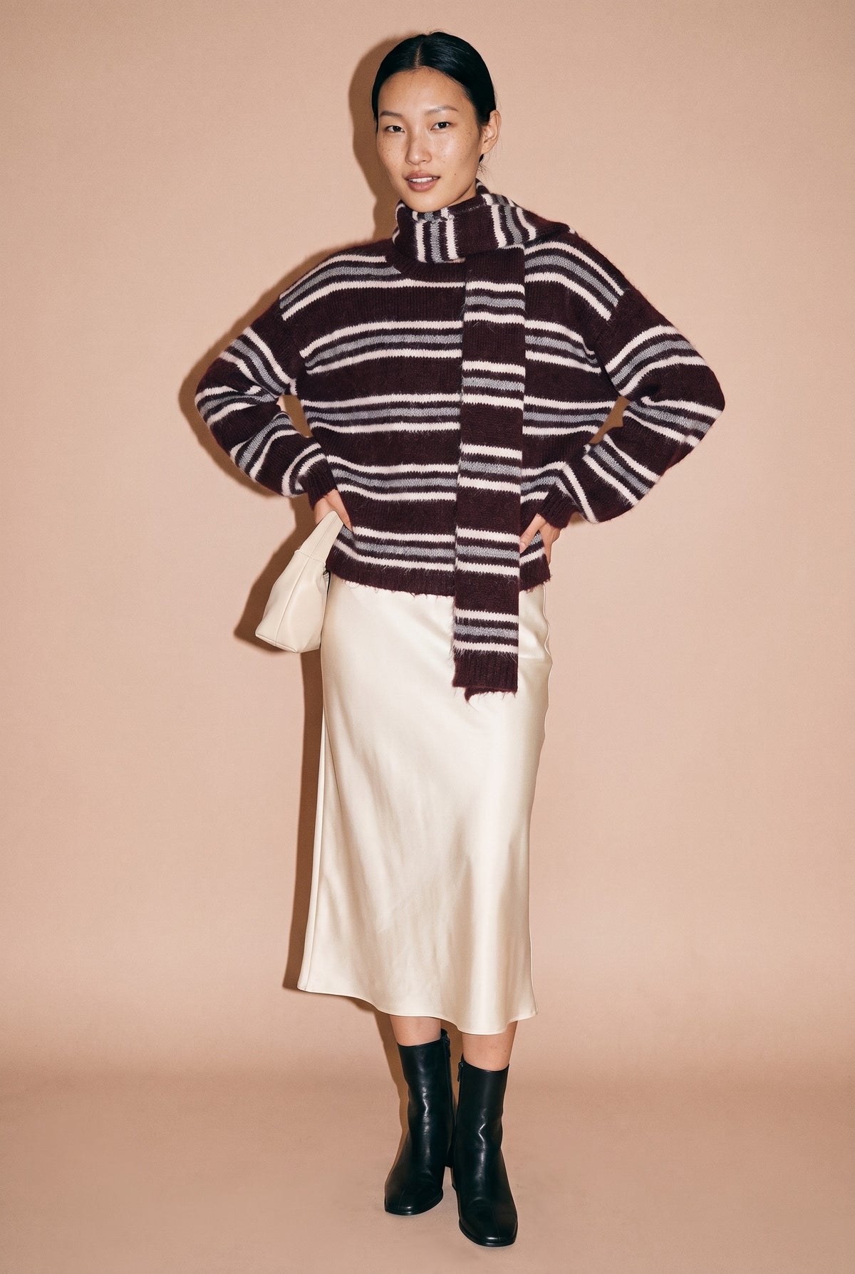 Crew Neck Stripe Pullover Sweater in burgundy — styled with satin slip skirt
